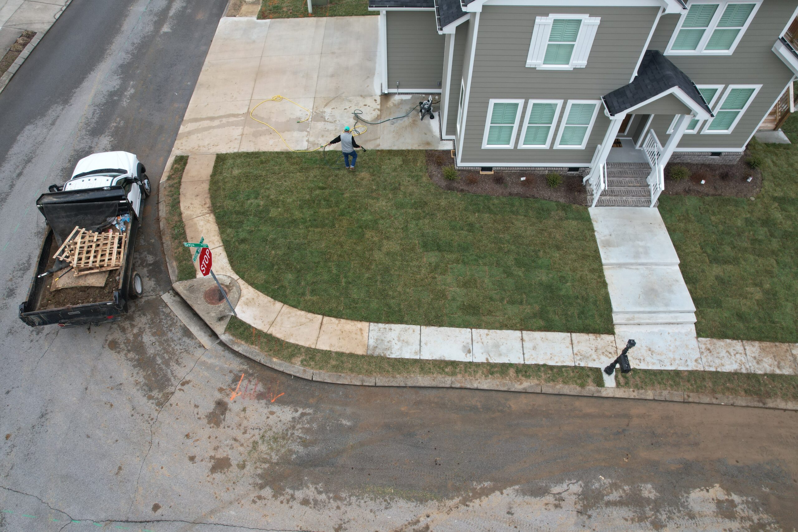 Ray Lawns crew watering freshly installed sod in Chattanooga TN